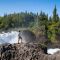 standing at Tanalian Falls in Lake Clark National Park