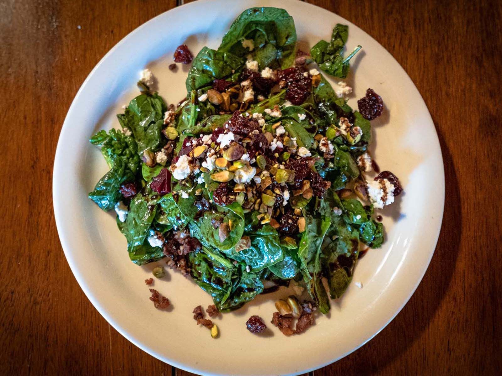 Spinach and kale salad with balsamic reduction glaze 